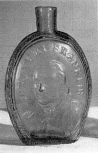 Illustration III: Benjamin Franklin: Made by Kensington Glass Works. Pint size. Found in aquamarine and dark brownish amber. Reverse has bust of T. W. Dyott. On the edges are the inscriptions "Where Liberty Dwells There Is My Country" and "Kensington Glass Works."