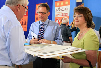 David Weiss (center) of Freemans Auctioneers, who was one of the appraisers at NPTs appraisal event in May,  is an expert on paintings, prints, sculpture, and Oriental rugs. He attended Antiques Roadshow in San Jose as a Prints & Posters appraiser, an event wonderfully detailed by CollectorsWeekly.com.