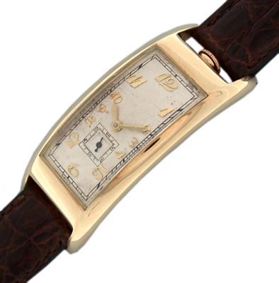 This Movado Polyplan from 1935 features a 14K yellow gold case and a unique movement whose shape curves with the wrist.