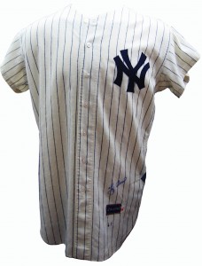 This is a 1961 Yankees uniform signed by catcher Yogi Berra. This is a 1961 Yankees uniform signed by catcher Yogi Berra.