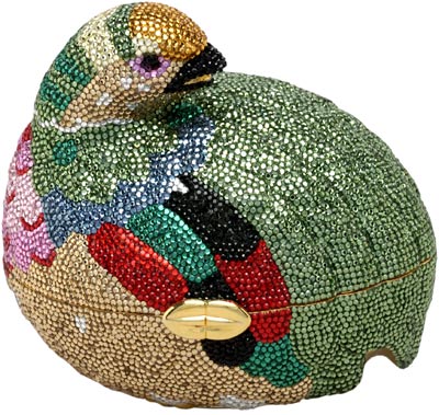 Judith Leiber is perhaps best known for her rhinestone-covered handbags, purses, and boxes, which are known as minaudieres. This one from 1980 is shaped like a grouse.