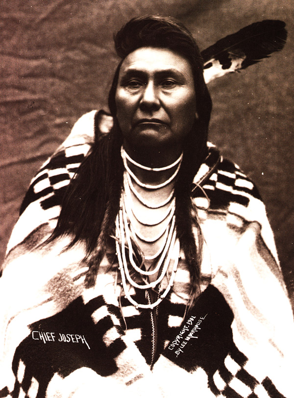 Chief Joseph wears a Pendleton blanket in 1901. He is famous for leading a long-standing resistance to the U.S. government, which had ordered the Nez Perce to move to an Idaho reservation. Photo by Major Lee Morehouse, courtesy of Bob Kapoun, via "Language of the Robe."
