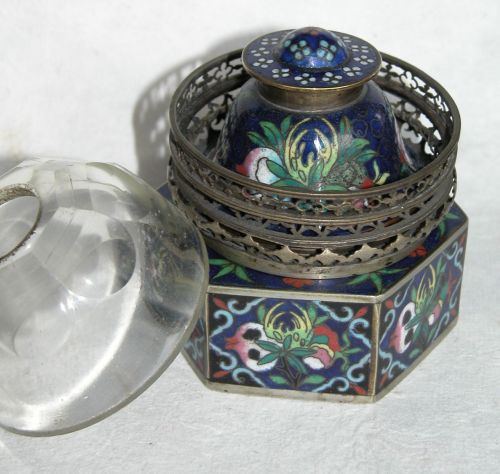 This opium lamp with extensive cloisonne ornamentation was found in New Orleans. 