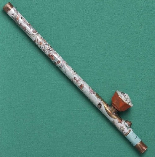 A rare opium pipe with a porcelain stem. Only a handful of these pipes survived anti-opium eradication campaigns.