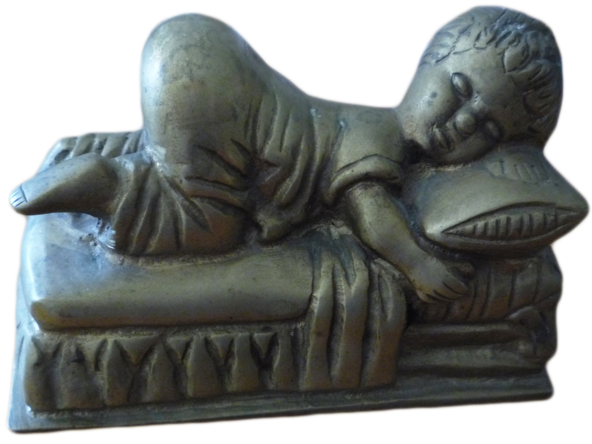 This 1891 bronze funerary figurine of a sleeping child is said to have come from a mausoleum haunted by the apparition of a little boy who drowned. 