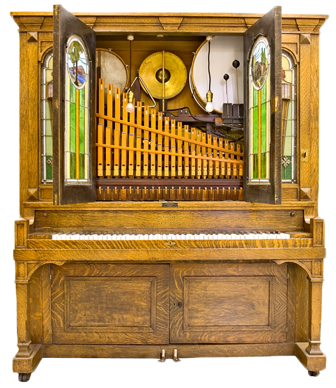 Top: Durward R. Center of Baltimore, Maryland, restored this Welte Style No. 6 Concert Orchestrion from 1895. Above: The interior of a Seeburg G orchestrion from 1913 containing a piano, mandolin, snare drum, bass drum, timpani, cymbal, triangle, and flute and violin organ pipes. Via the National Music Museum, at the University of South Dakota, Vermillion.
