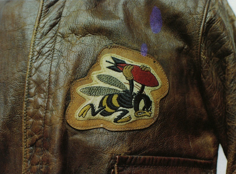 "Wee Willie," a bee carrying a red bomb, was the insignia of the 21st Bomb Squadron, 30th Bomb Group. The patch is sewn to the A-2 of Captain Earnest C. Pruett, who flew B-24 Liberators.