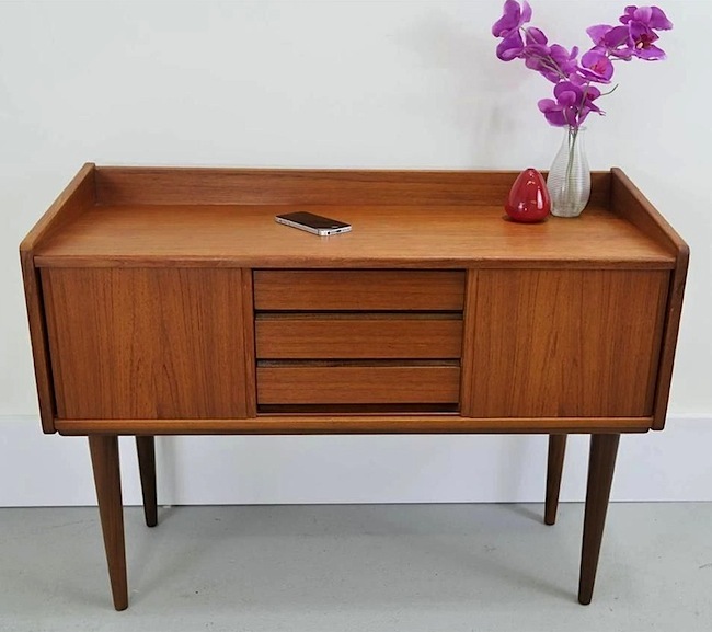 This 1960s Danish Modern teak desk and the modern-day iPhone embody Stephen Bayley's ideals of beautiful design.