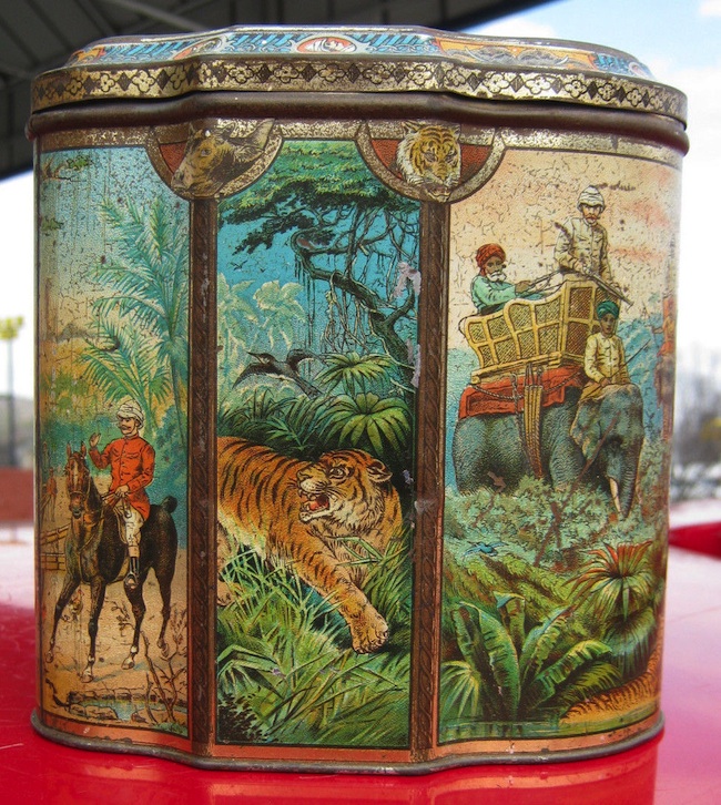 This Huntley and Palmers Indian Elephant biscuit tin, circa 1894, features a unique shape and elaborate color lithography.