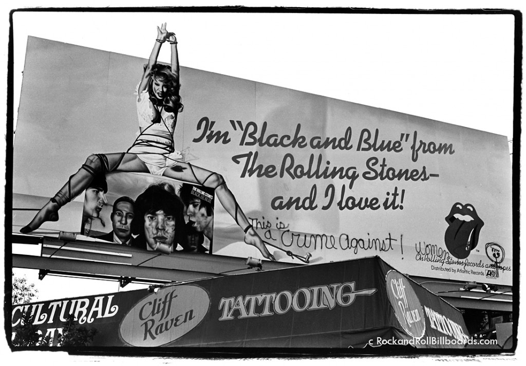 Some billboards created controversy, like this 1976 ad for "Black and Blue," which Landau captured complete with outraged graffiti about violence against women. Photo by Robert Landau.