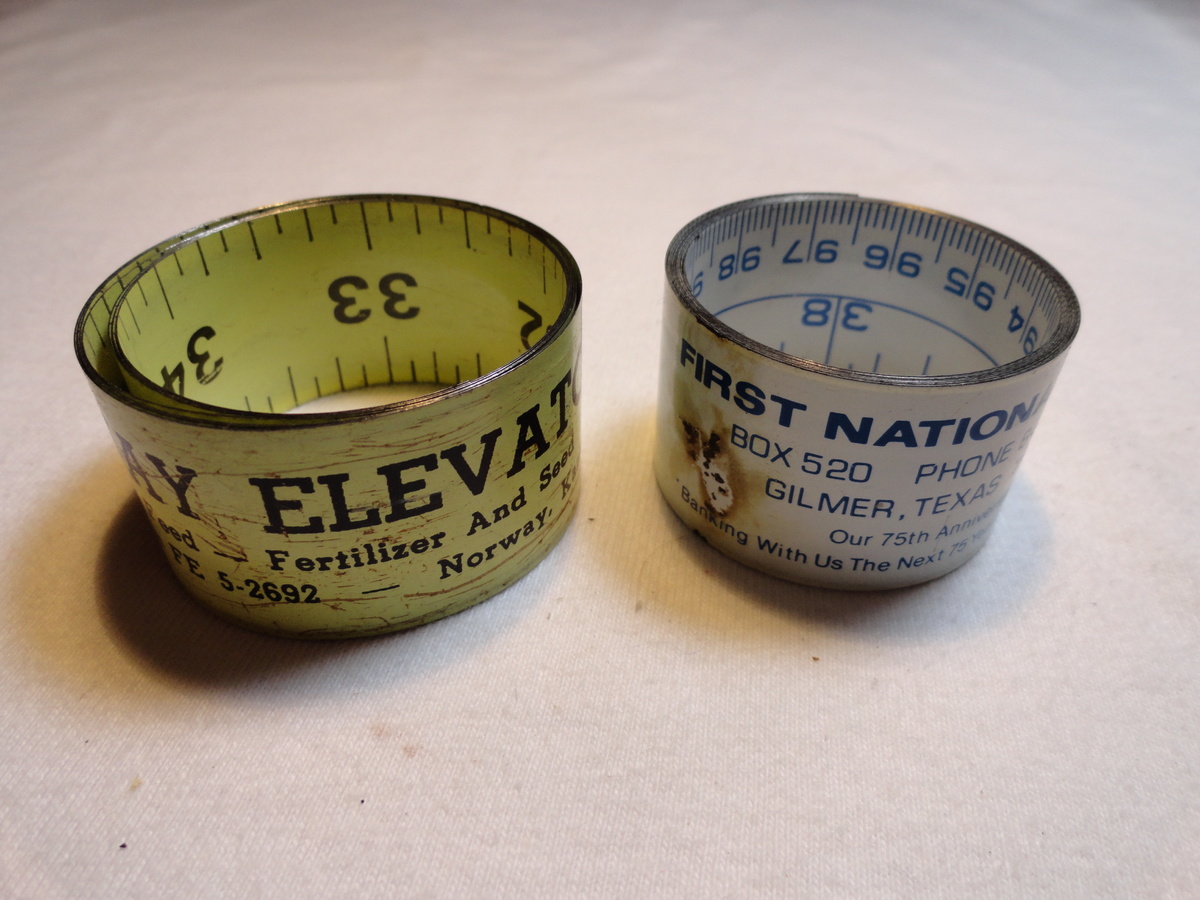 Metal Band Measures - First National Bank Gilmer Texas 75th Anniversary - Advertising