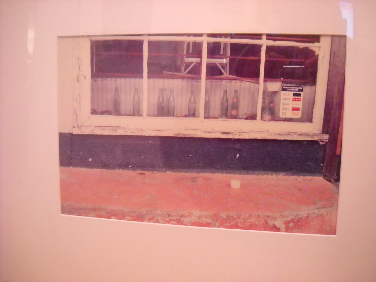 William Eggleston "Bottles In Window" photo.