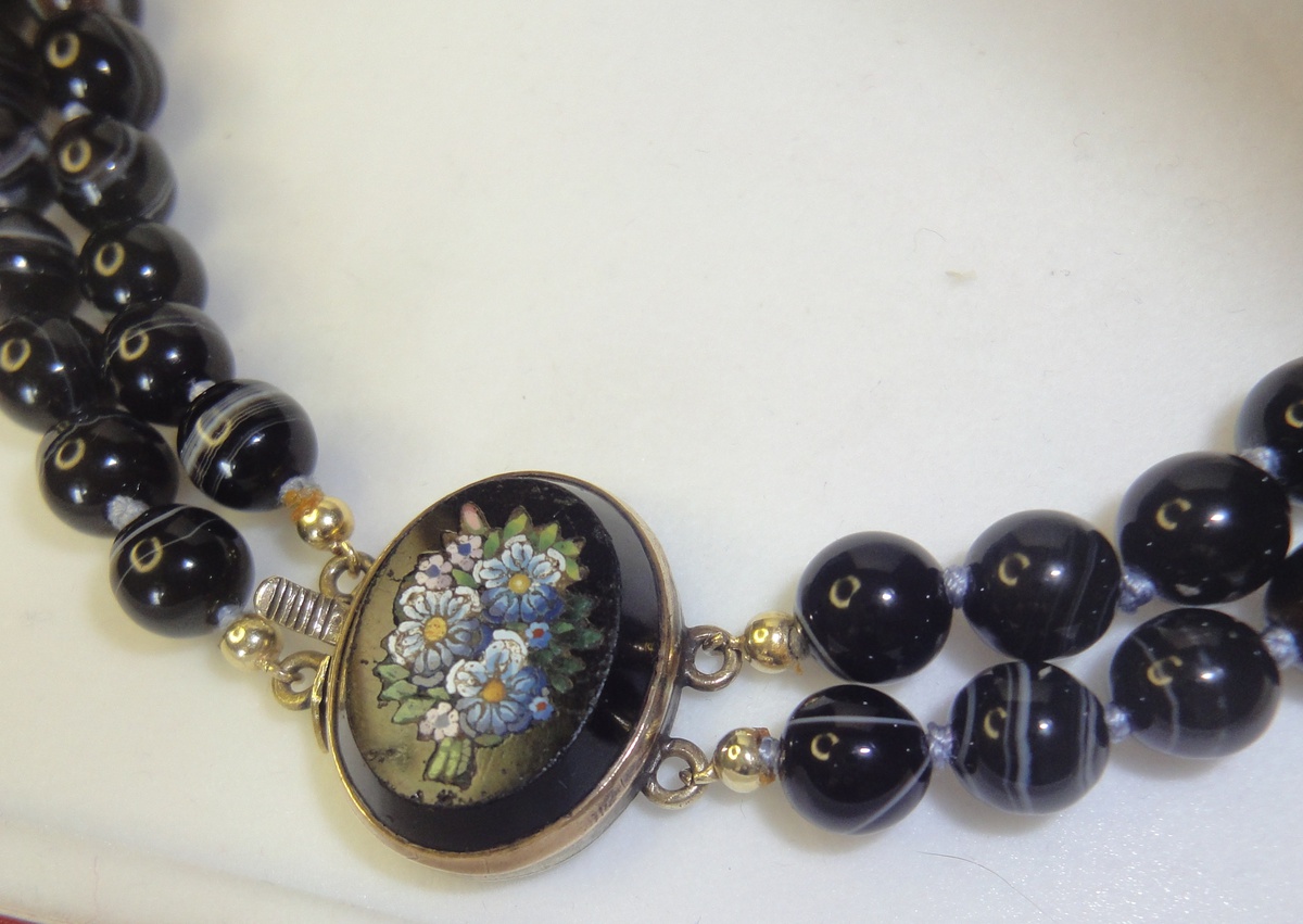 A 2-rows Eye Agate bead necklace with a Micro Mosaic locket . One of my favorites!