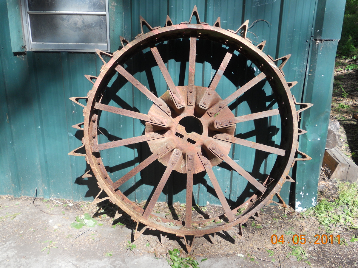 Old Tractor Wheels have steele cletes on them - Tractors