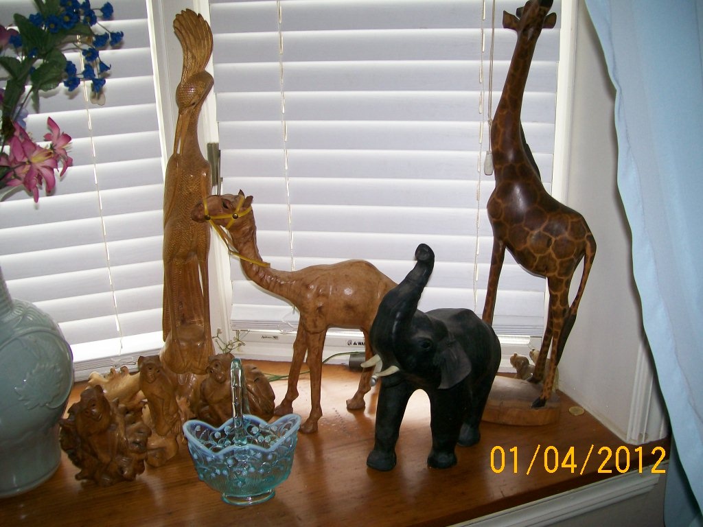 Collection of animals and a Fenton basket 