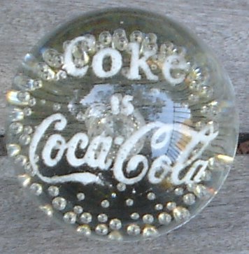 Paperweight: Coke is Coca-Cola but this is Serious Glass.  Disagree?