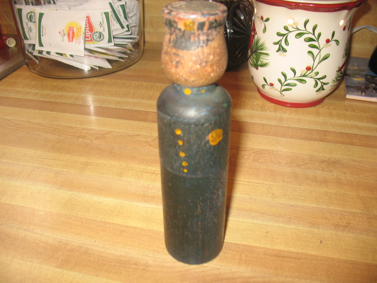 Wooden policeman crayon holder?