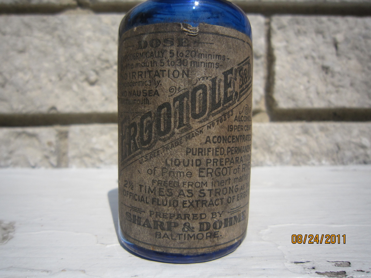 1908-1912 ABM Ergotole Sharp & Dohme Baltimore Cobalt Blue Medicine Bottle w/ Label