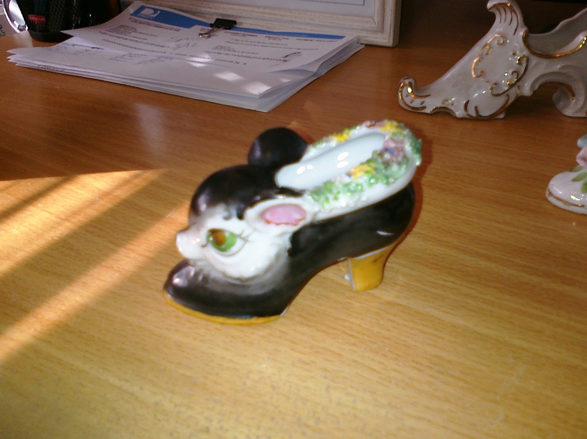 Porcelain Shoe with animal of some sort - Art Pottery