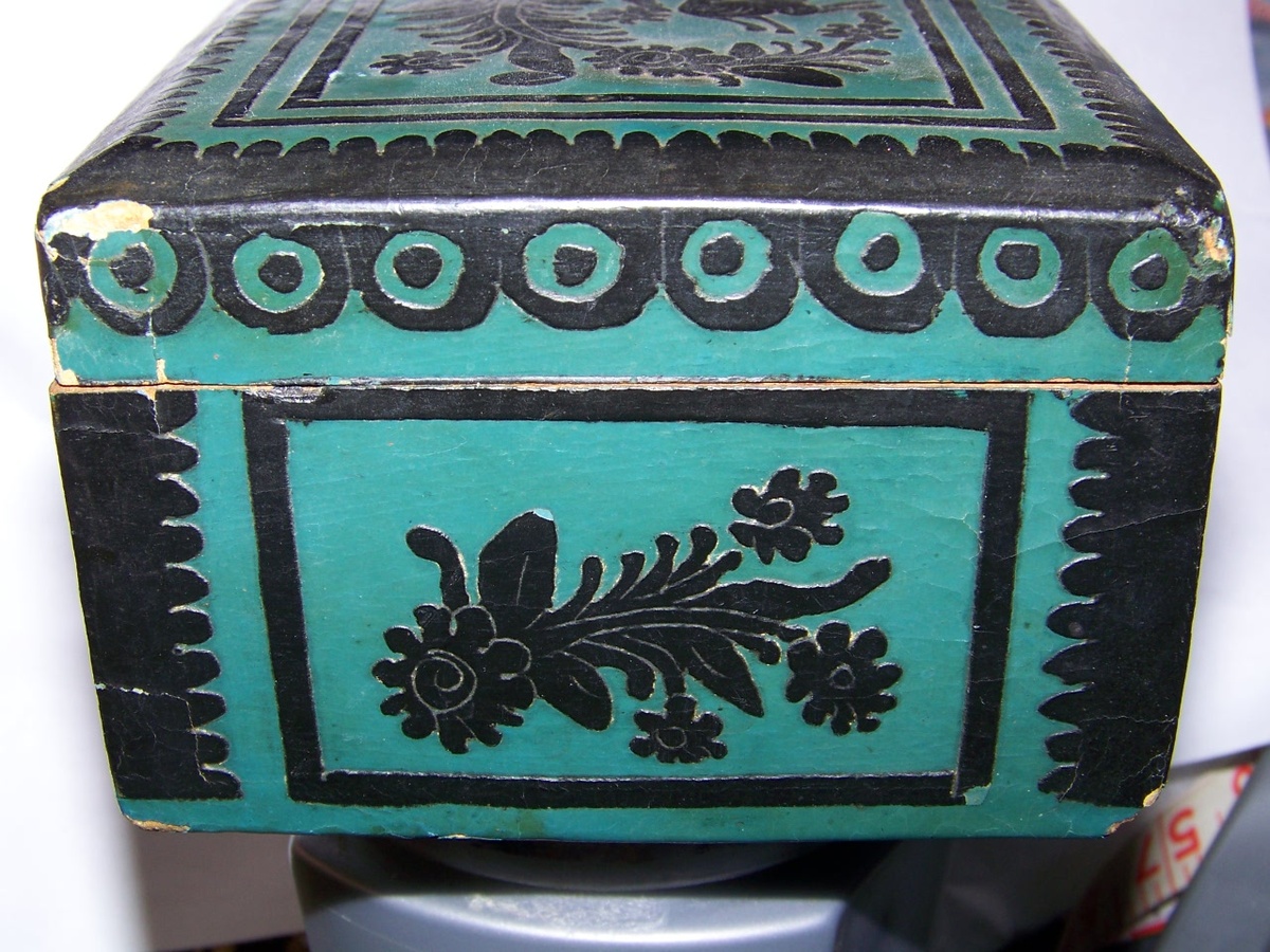 Folk or primitive box with paper cut outs