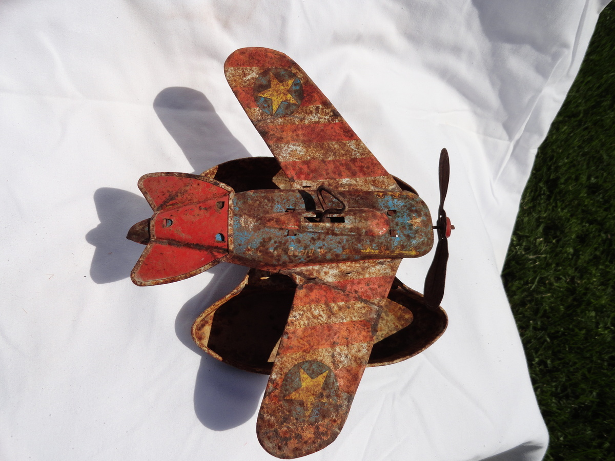 Coast Guard Pontoon Seaplane - - Tin - - a rusty toy that clearly was played with, hard