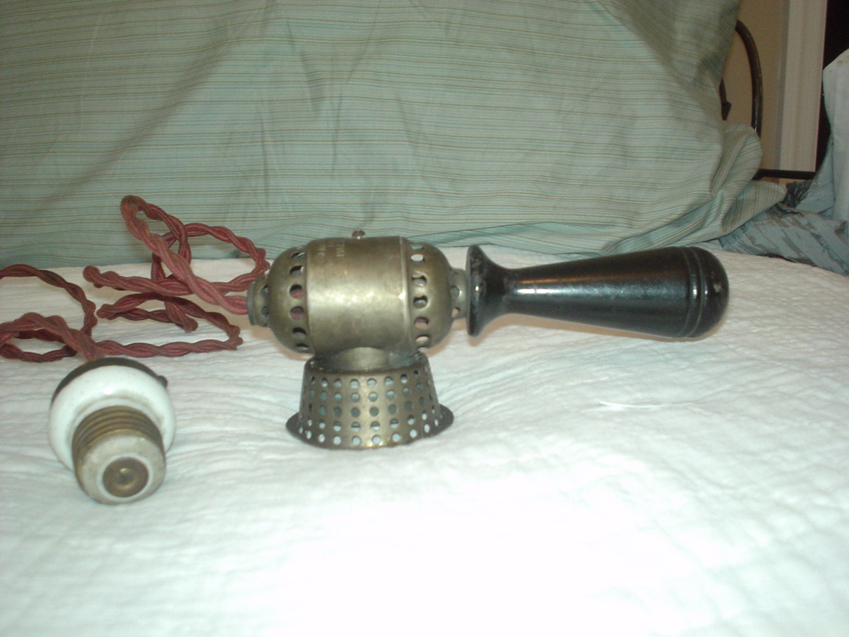 Very early G.E. electric cigar lighter with screw in plug