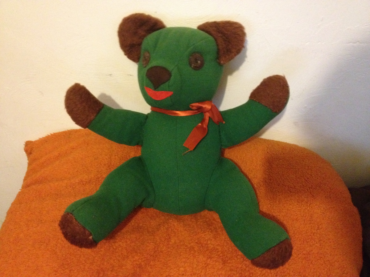 Able to identify this beautiful old green bear?