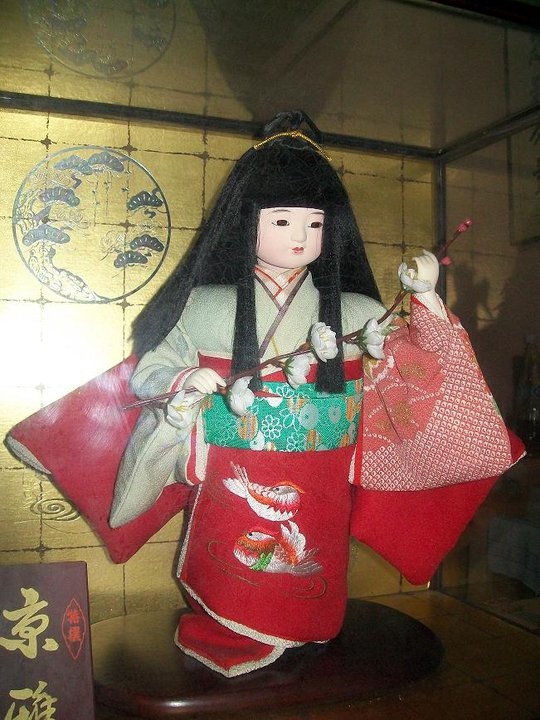 Japanese doll with Cherry Blossom