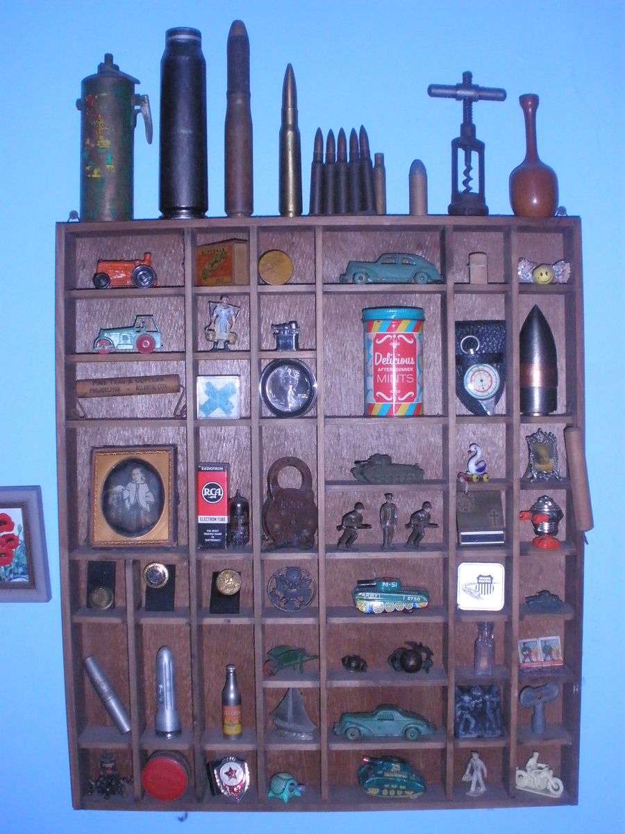 Shadow box full of goodies. - Model Cars