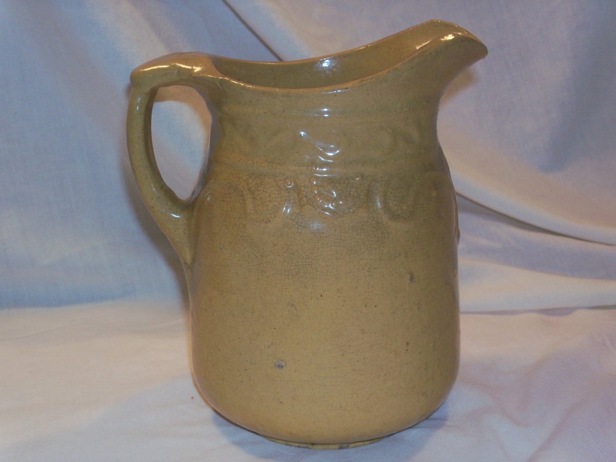Old pottery pitcher - Art Pottery