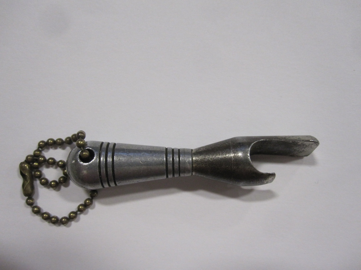 Bottle Opener, Measuring Device ?