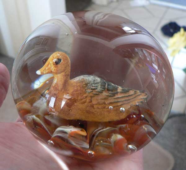 Duck Sulphide paperweight embossed STA on base.