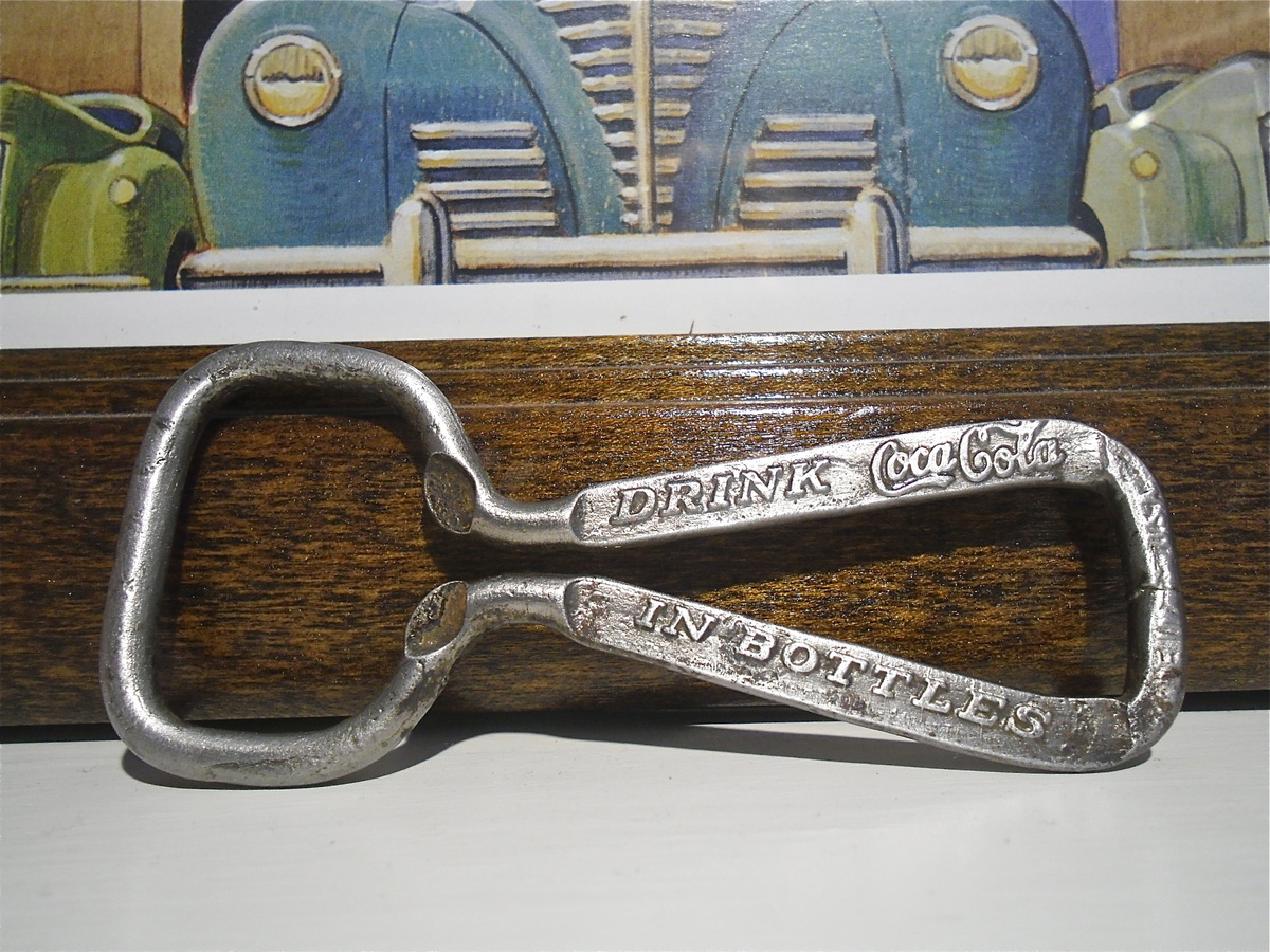 1920 to 1940s Metal Coca Cola opener.