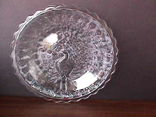 Information needed on small crystal Peacock plates with an M.  - Glassware