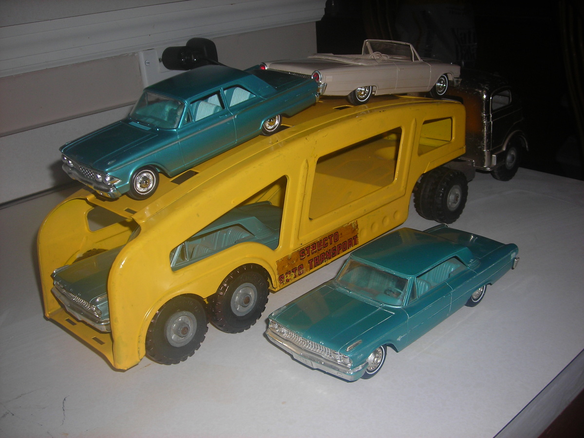 Structo autocarrier with 1963 Ford Galaxie promo cars heading to re-stoc k a dealership like the real thing!