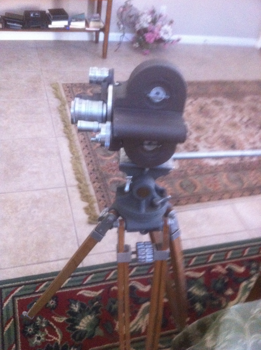 wooden movie tripod and camera - Cameras