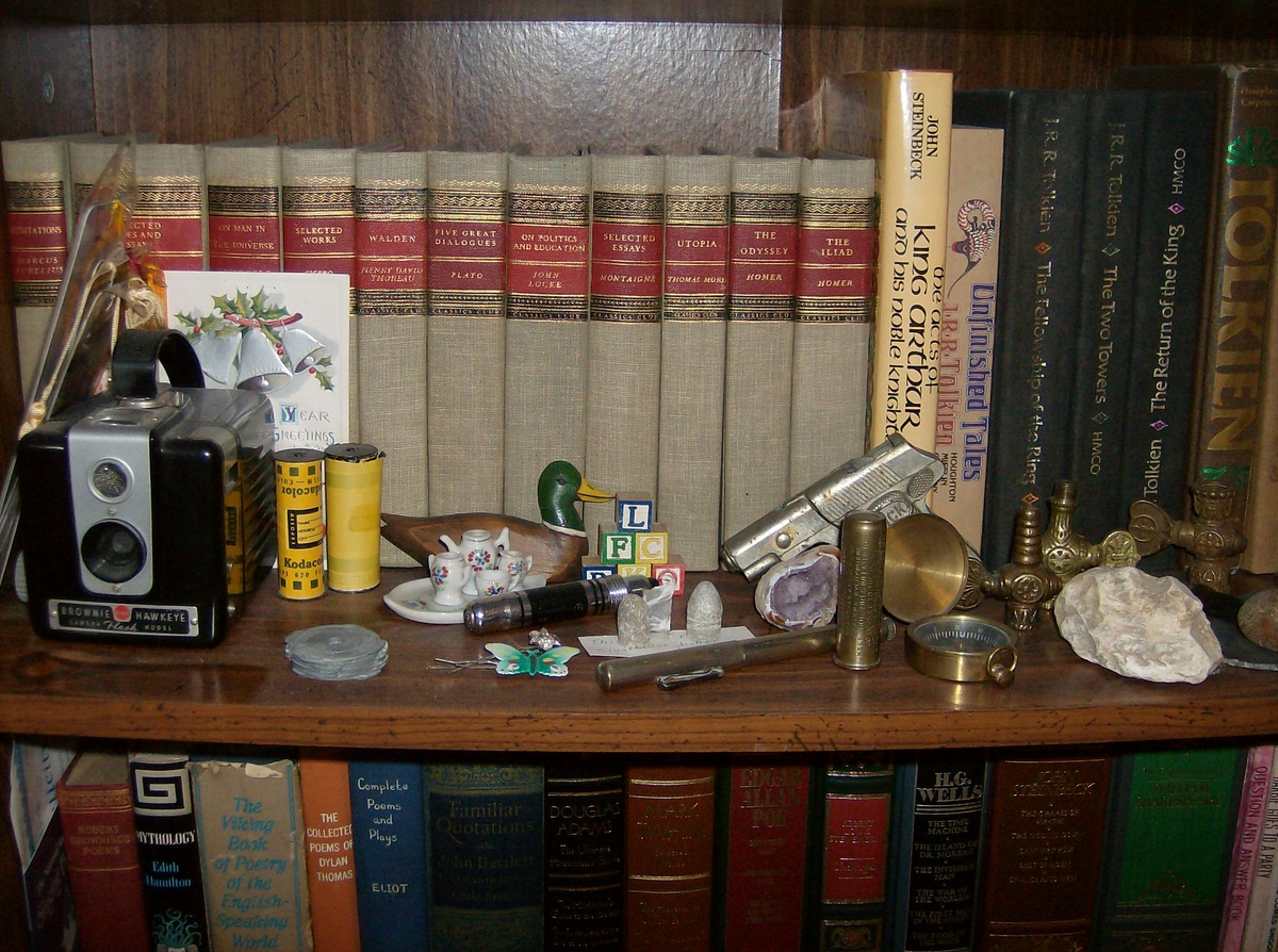 Books Shelves Full Of Stuff