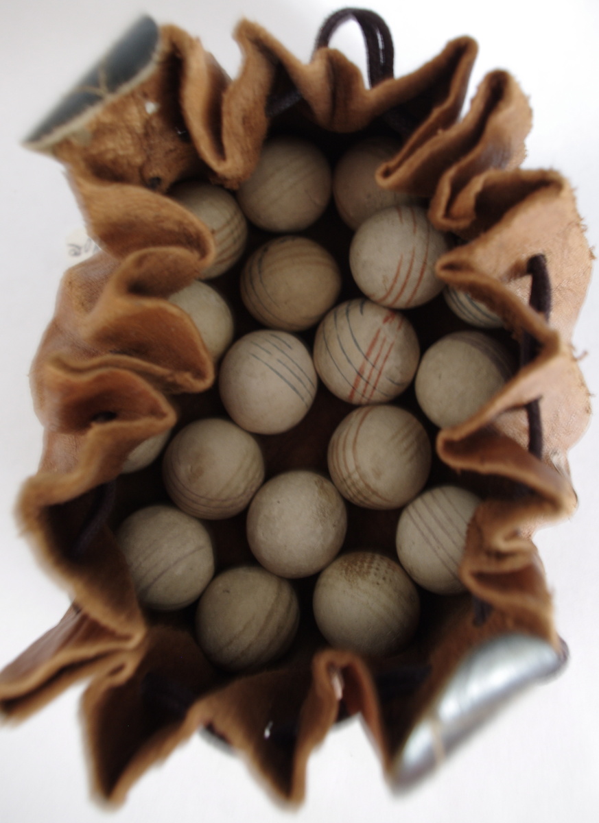 Old bag of clay marbles