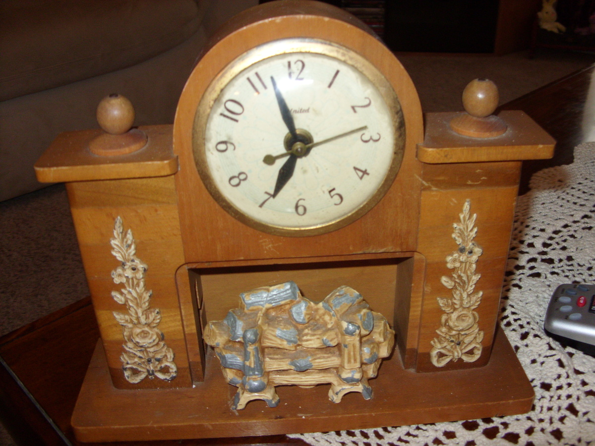 nice united fireplace clock