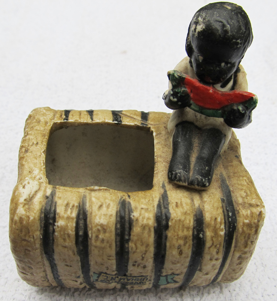 BLACK BOY ON COTTON BALE EATING WATERMELON - Art Pottery