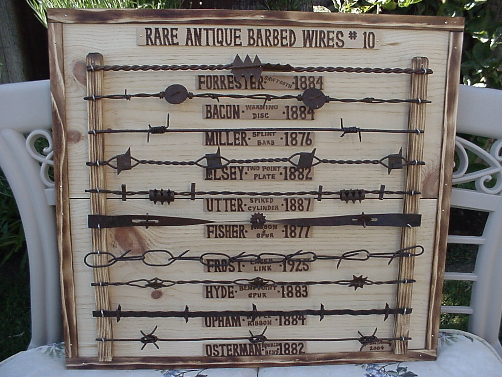 2 of my 11 rare barbed wire plaques