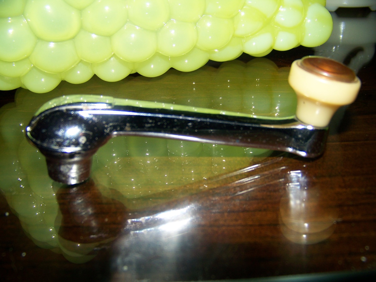 Chrome and bakelite ? window crank