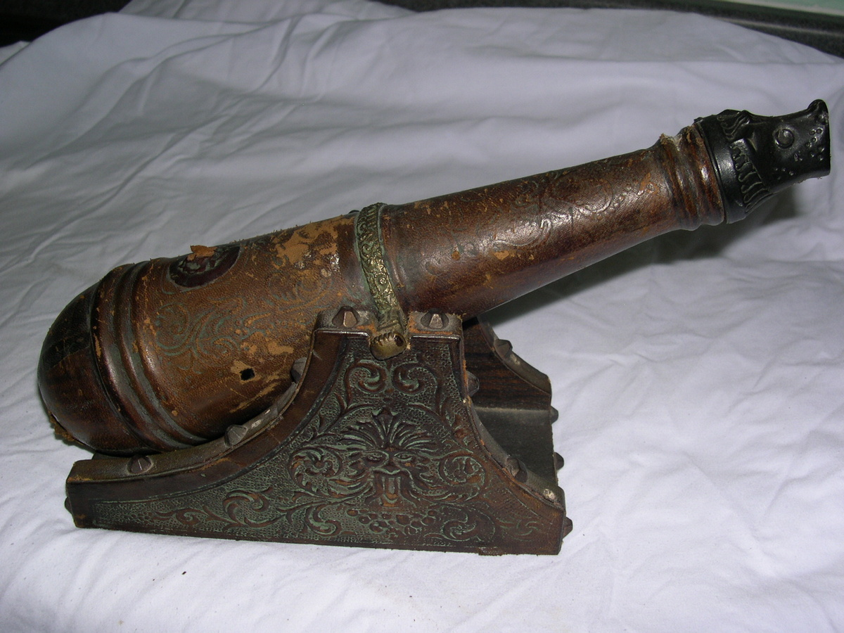 Leather wrapped cannon liquor bottle - Bottles