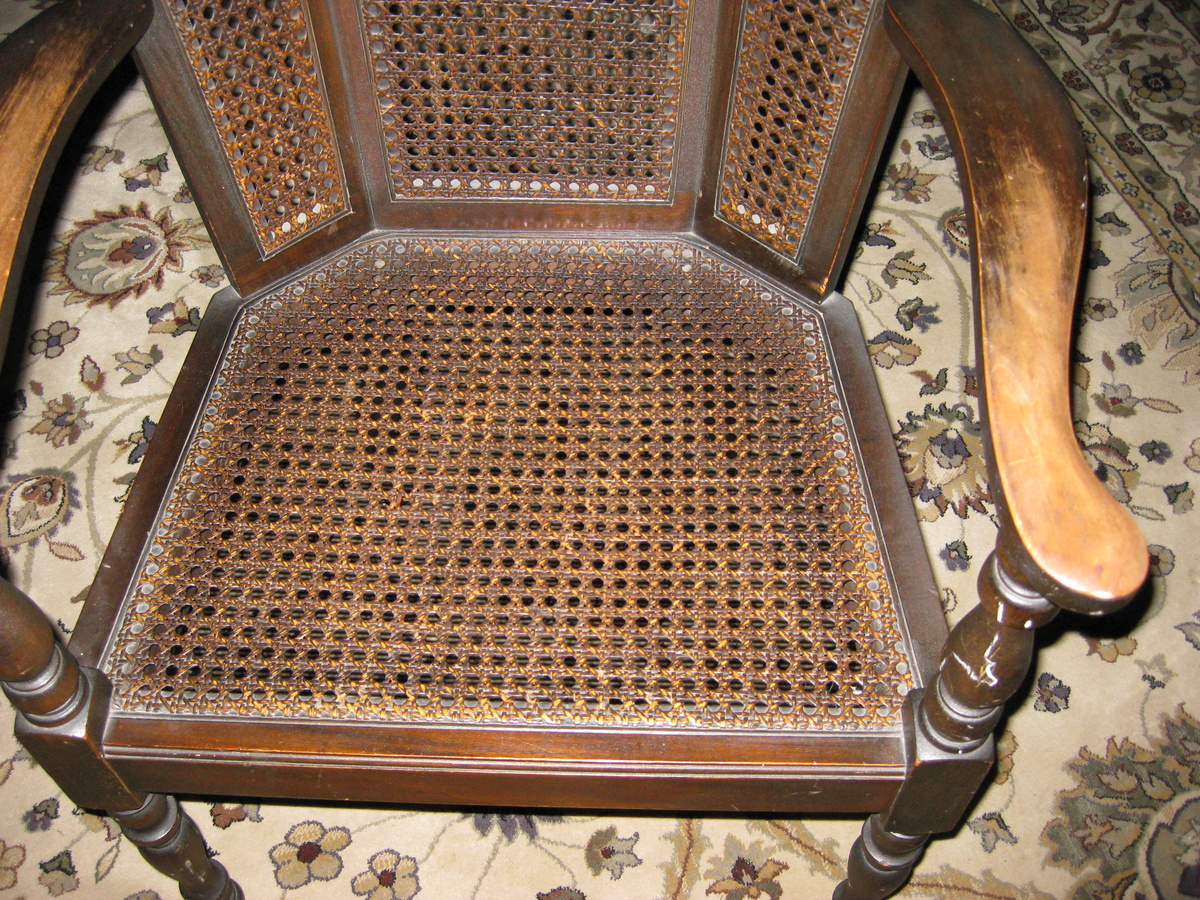 Cane wing-back chair.  Old? - Furniture