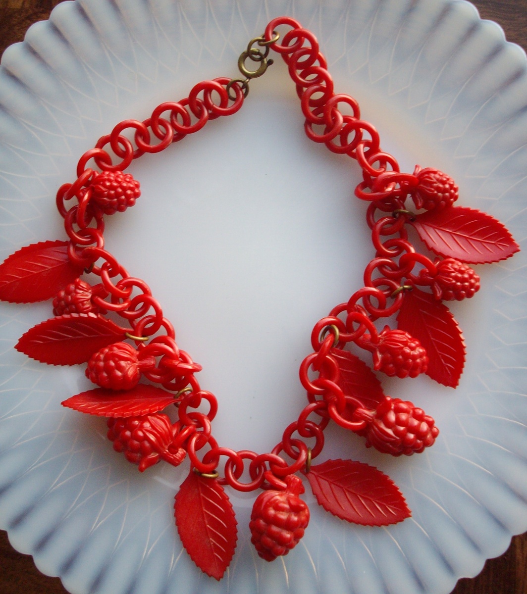 Red celluloid chain and charm necklace. New favorite!