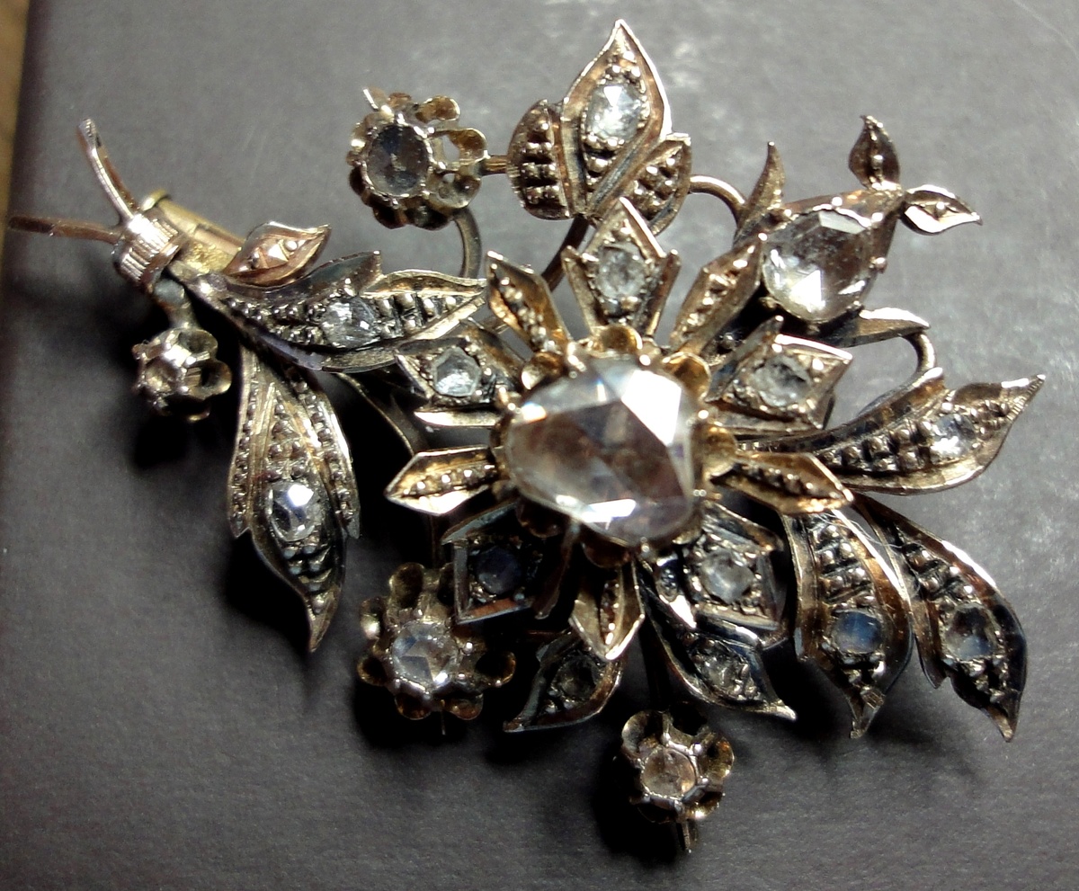 Rose gold flower brooch with European rose cut diamonds