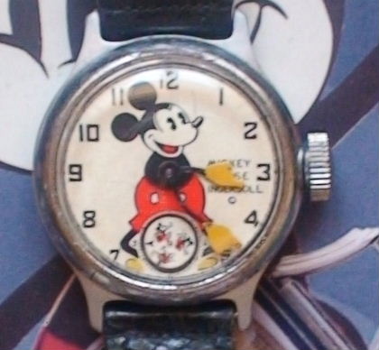A very nice 1934 Ingersoll Mickey with original leather strap
