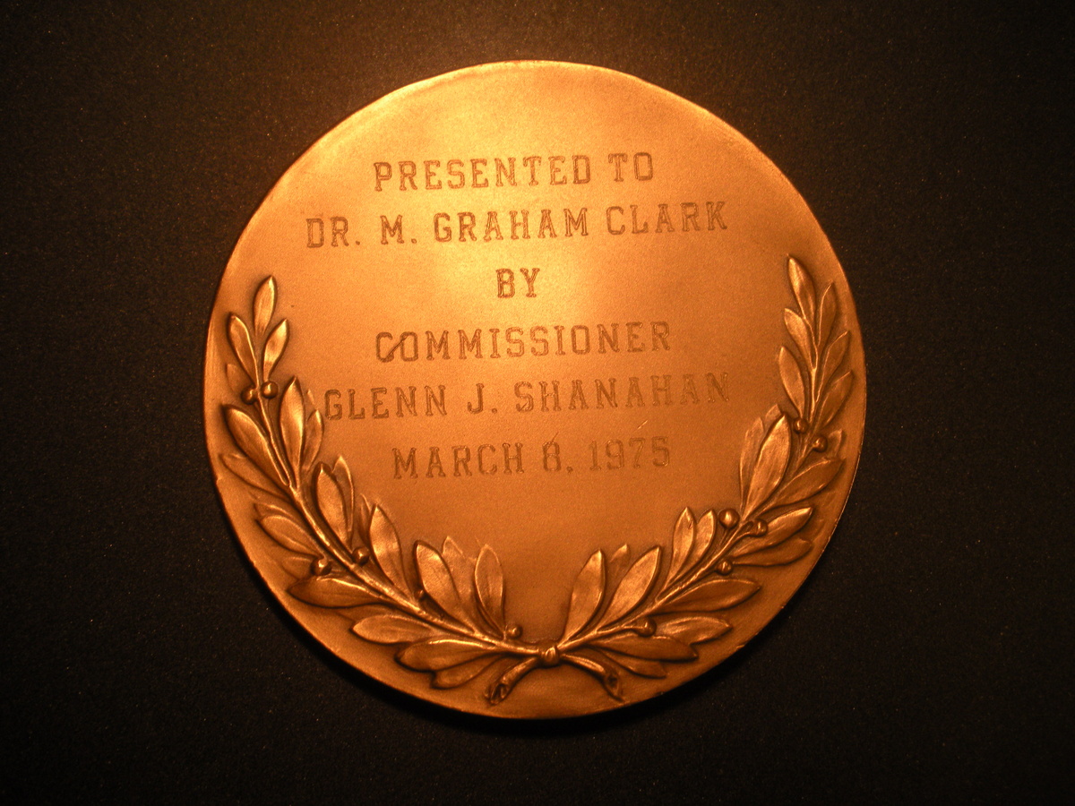 An award give to Dr. M. Graham Clark - President, College of the Ozarks by the City of Wichita Sedgwick County Kansas - Advertising