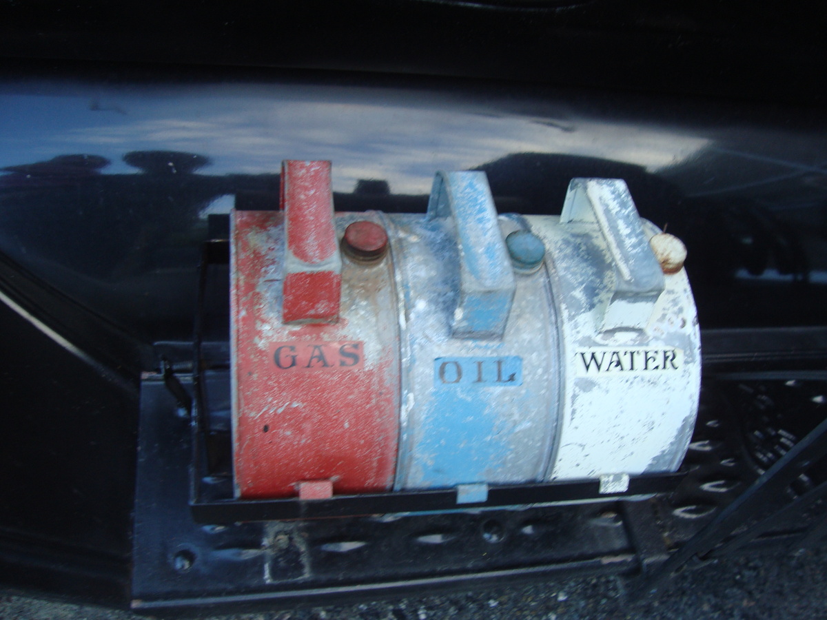 oil cans on model t    - Petroliana
