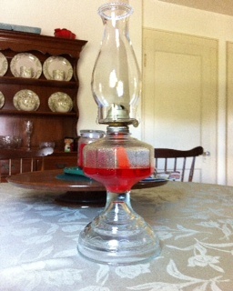 Can you substitute non-kerosene oil in an old lamp?